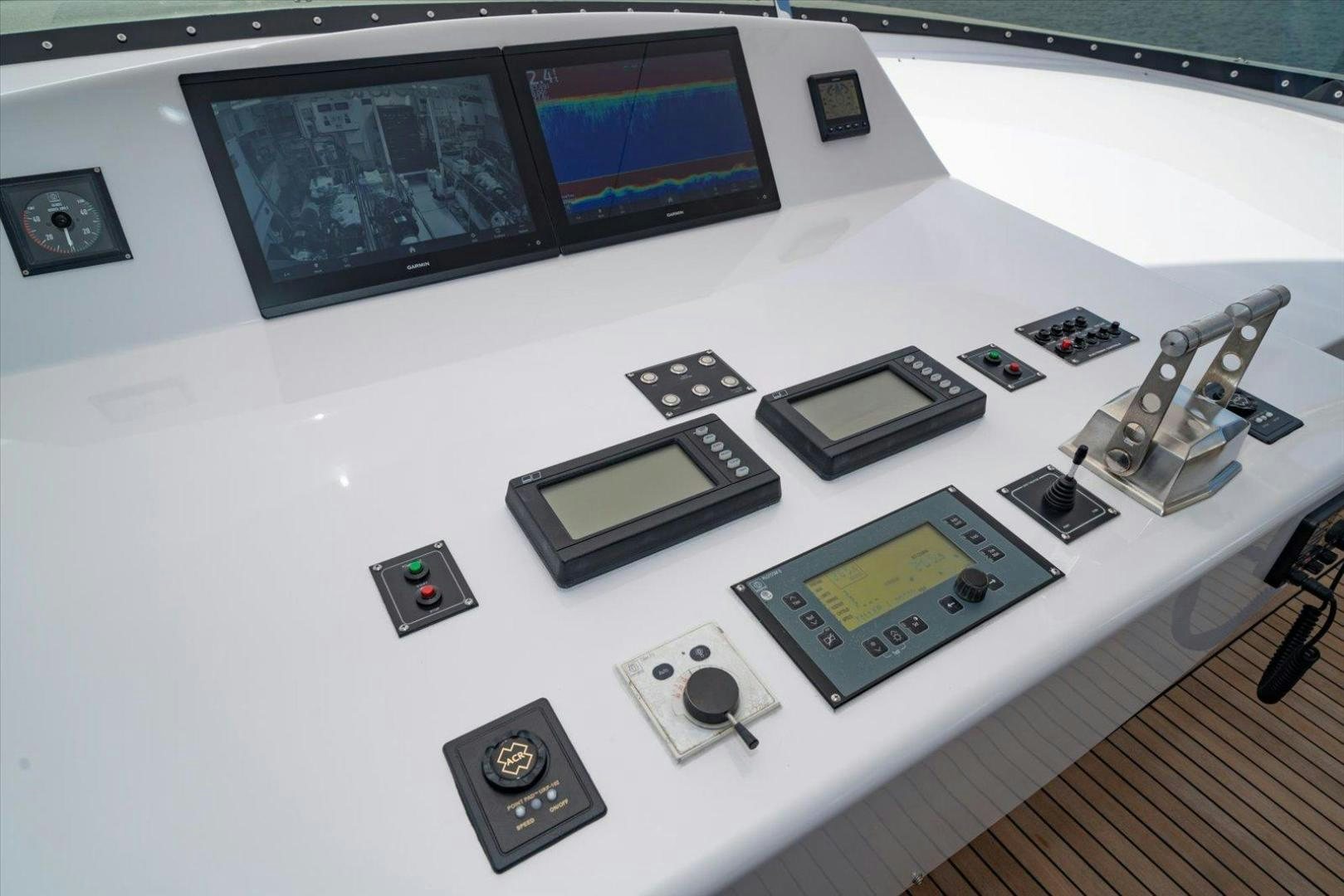 a table with many electronics aboard NORTH COAST 120 Yacht for Sale