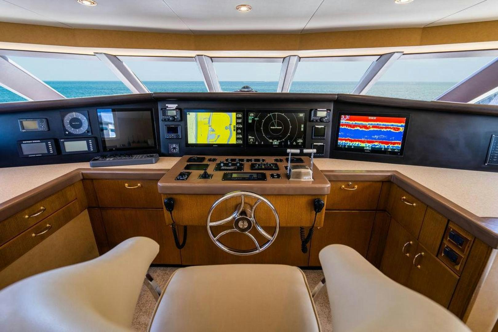 a control room with a large window aboard NORTH COAST 120 Yacht for Sale