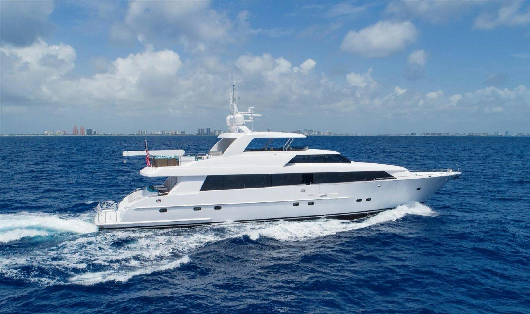 a white yacht on the water aboard NORTH COAST 120 Yacht for Sale