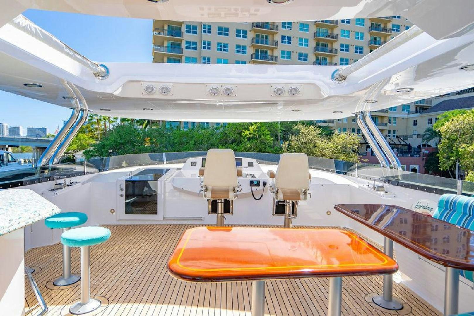 a boat with chairs and tables aboard NORTH COAST 120 Yacht for Sale