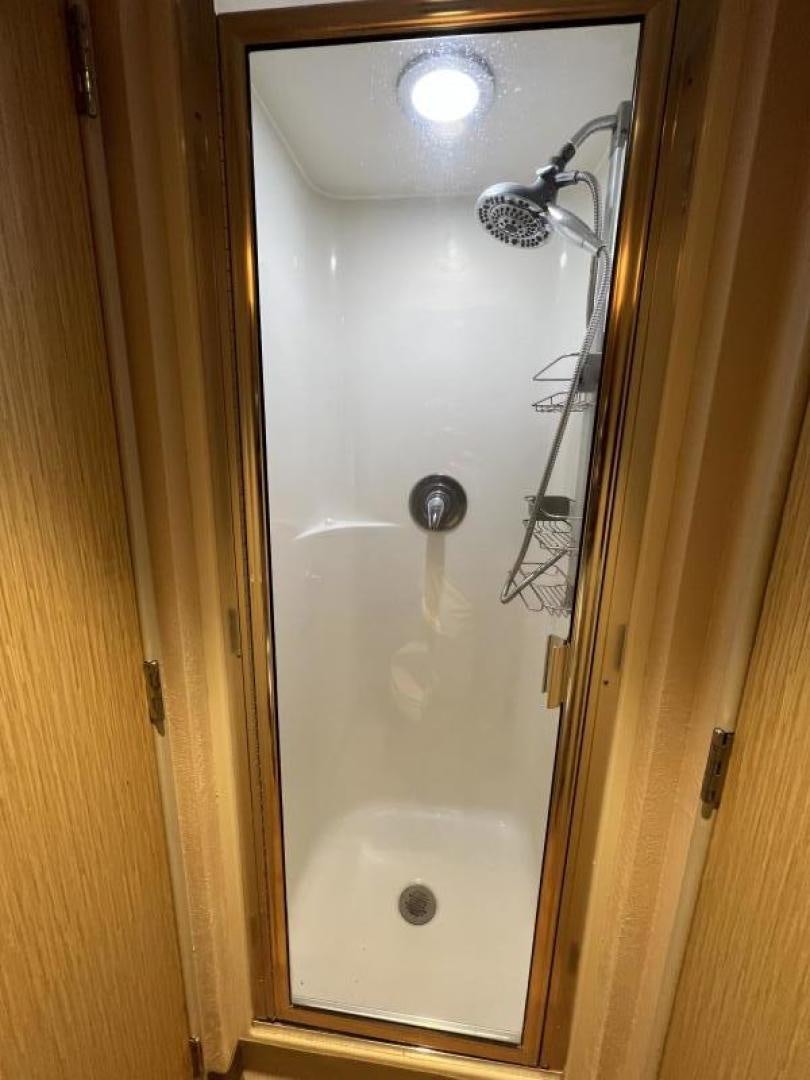a door with a light fixture aboard NORTH COAST 120 Yacht for Sale