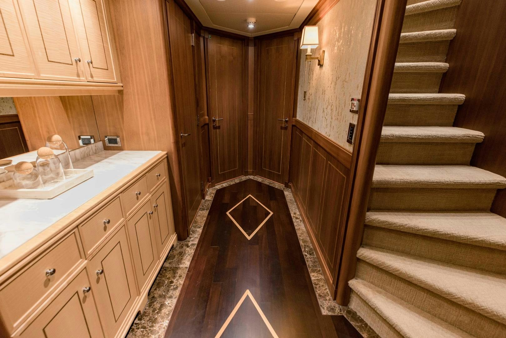 a bathroom with a marble countertop aboard INVICTUS Yacht for Sale