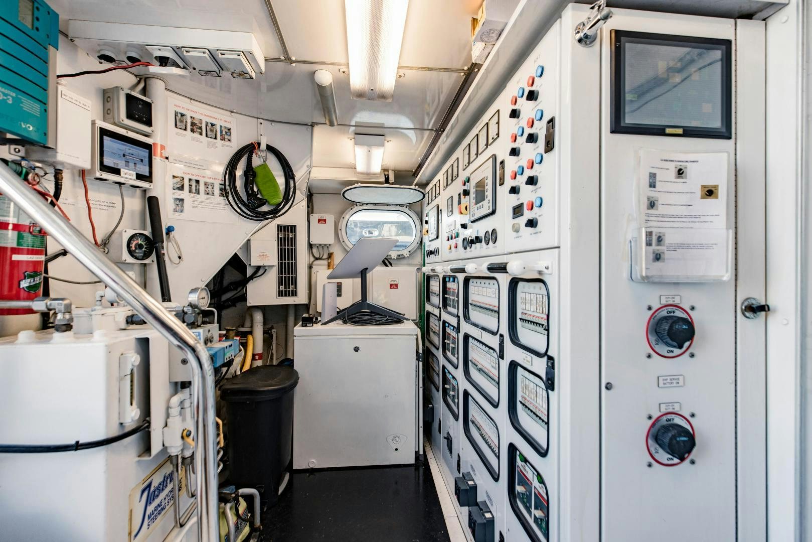 a room with machines and equipment aboard INVICTUS Yacht for Sale