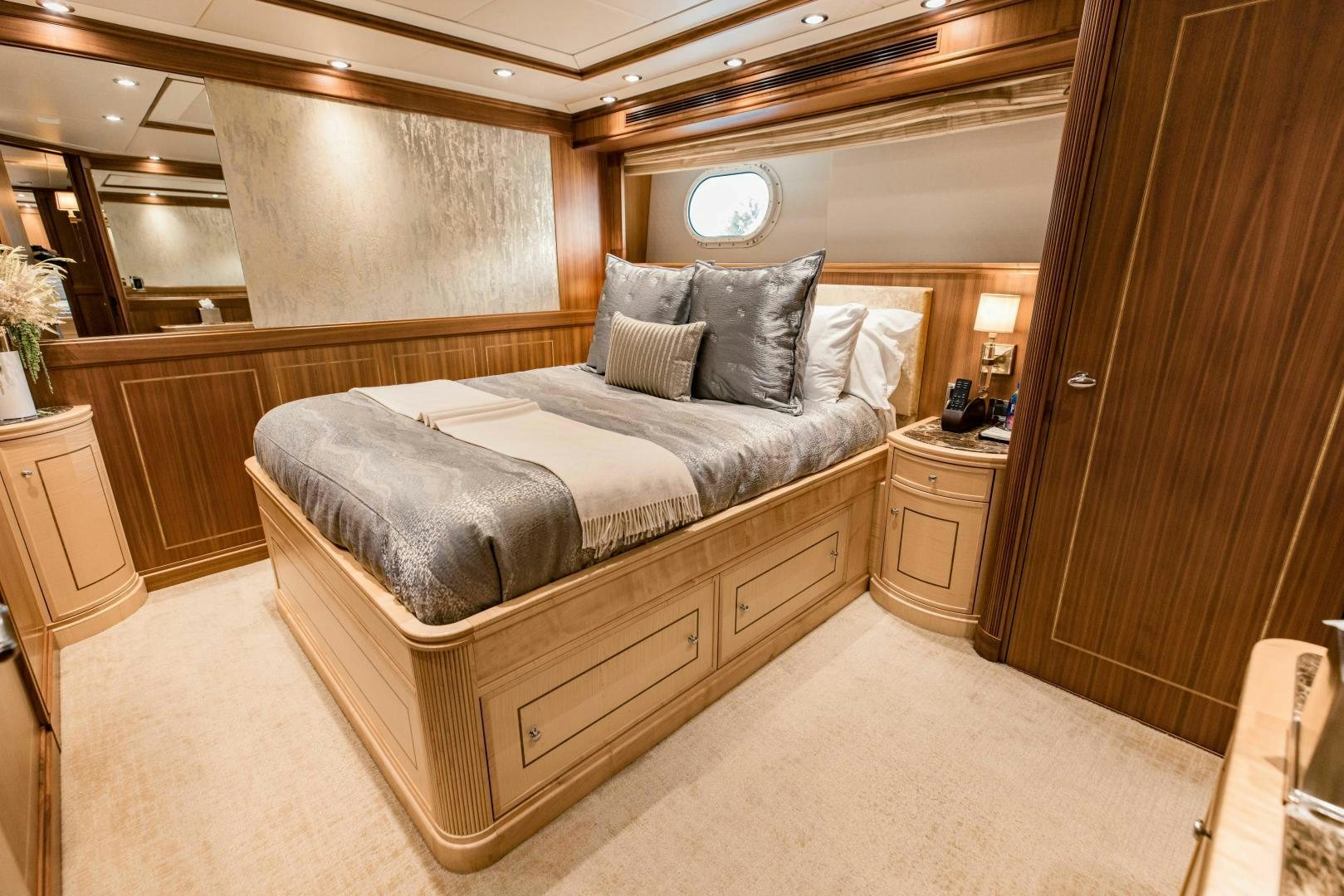 a bed in a room aboard INVICTUS Yacht for Sale