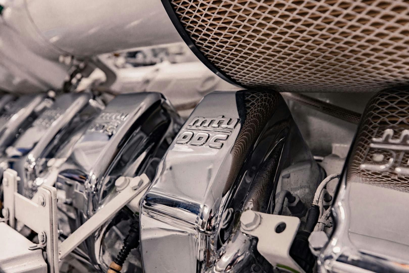 the engine of a car aboard INVICTUS Yacht for Sale