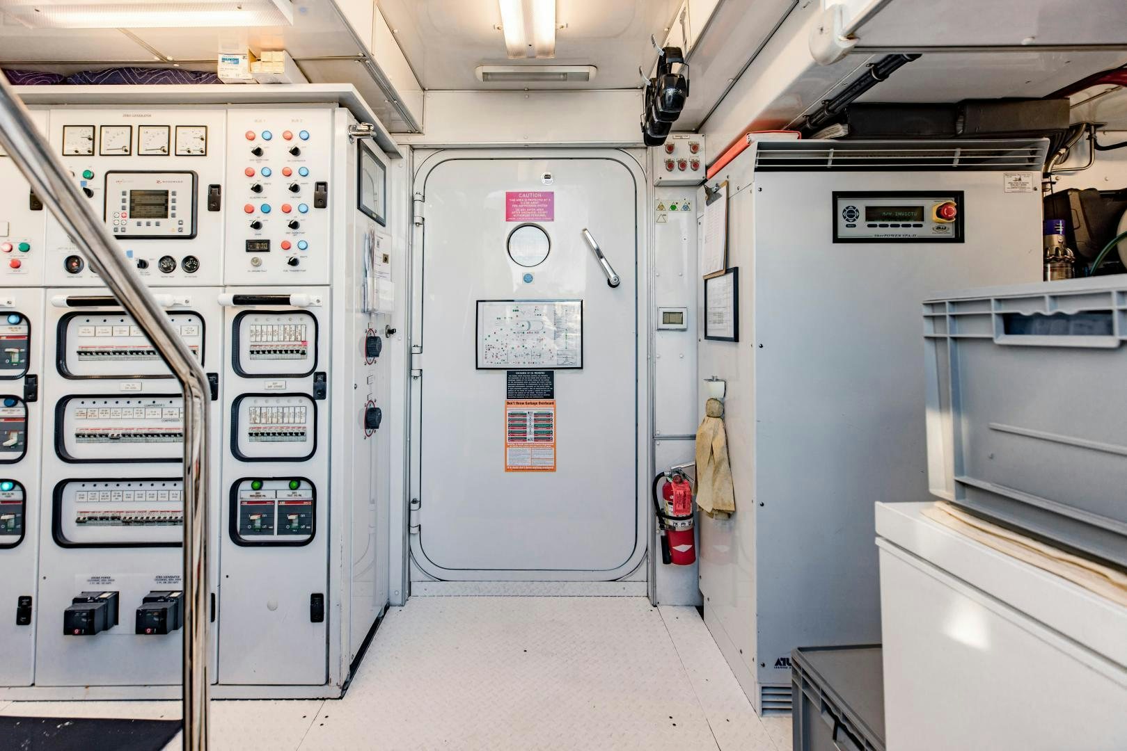 a row of white machines aboard INVICTUS Yacht for Sale