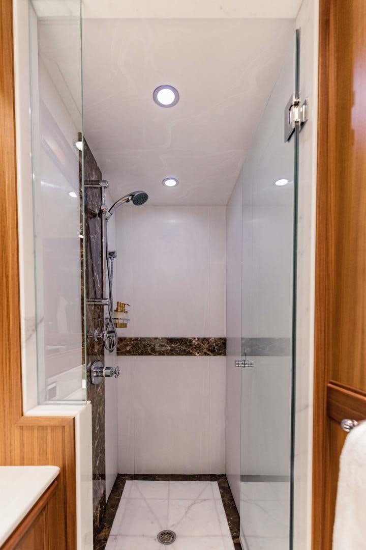 a shower unit in a bathroom aboard INVICTUS Yacht for Sale