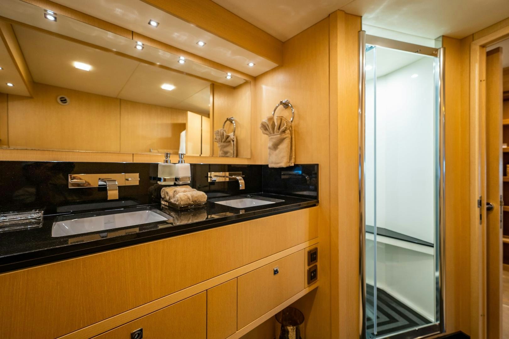 a kitchen with a sink and a door aboard THE KING Yacht for Sale