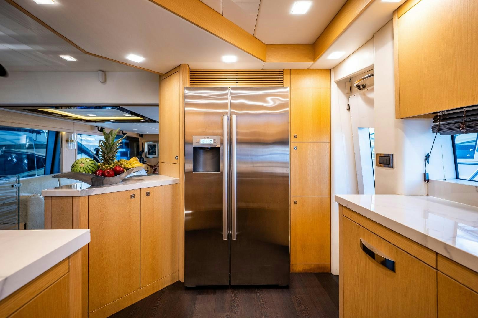 a kitchen with a glass door aboard THE KING Yacht for Sale