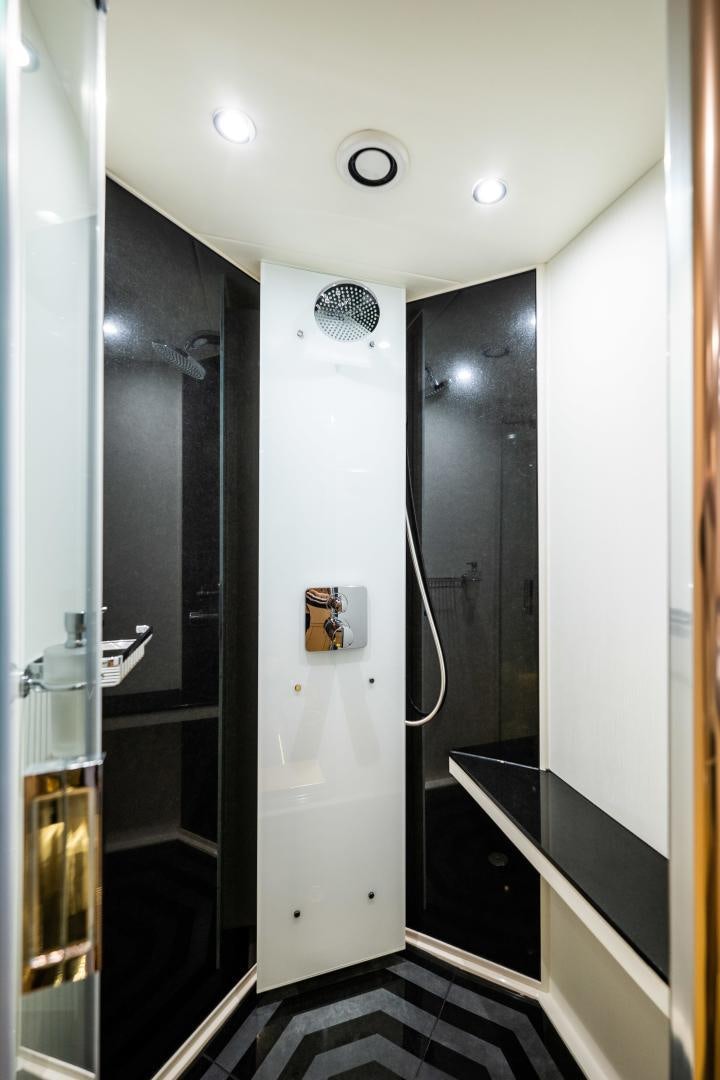 a shower unit in a bathroom aboard THE KING Yacht for Sale
