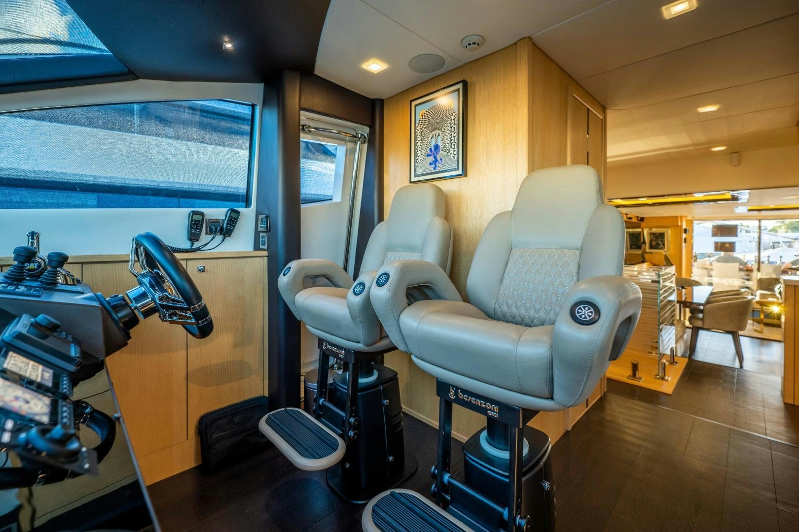 a room with a desk and chairs aboard THE KING Yacht for Sale