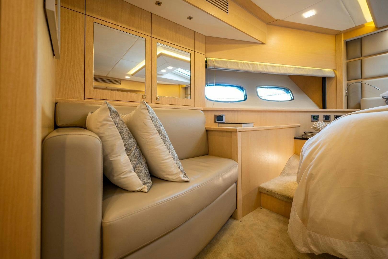 a room with a couch and a desk aboard THE KING Yacht for Sale