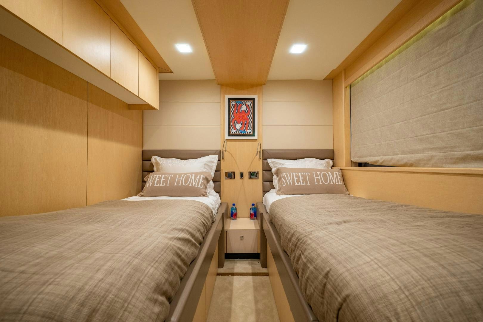 a room with two beds aboard THE KING Yacht for Sale