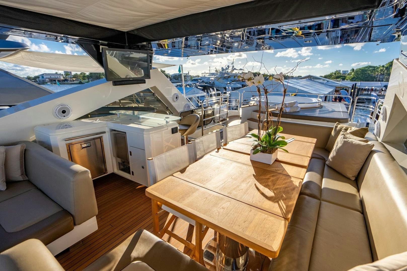 a room with a table and chairs aboard THE KING Yacht for Sale