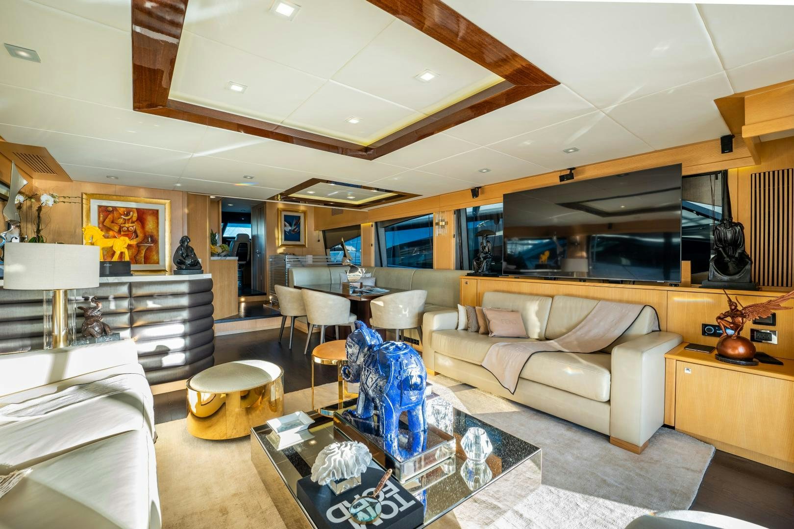 a living room with a large fireplace aboard THE KING Yacht for Sale