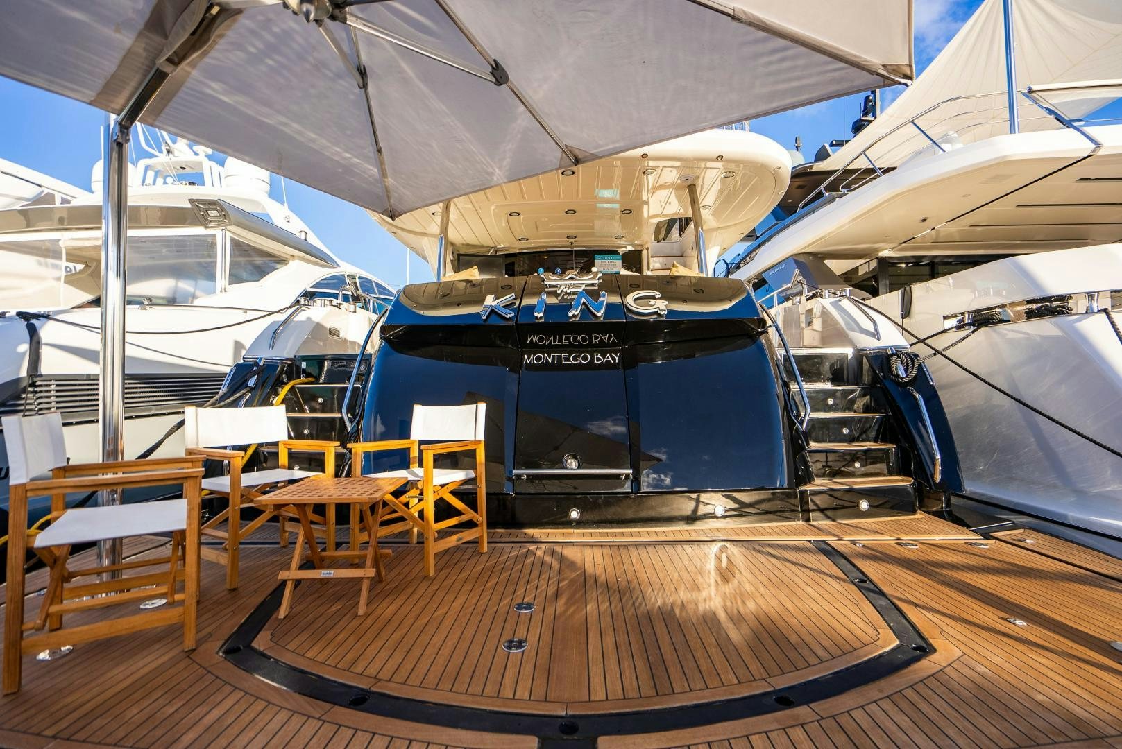 a boat on a deck aboard THE KING Yacht for Sale
