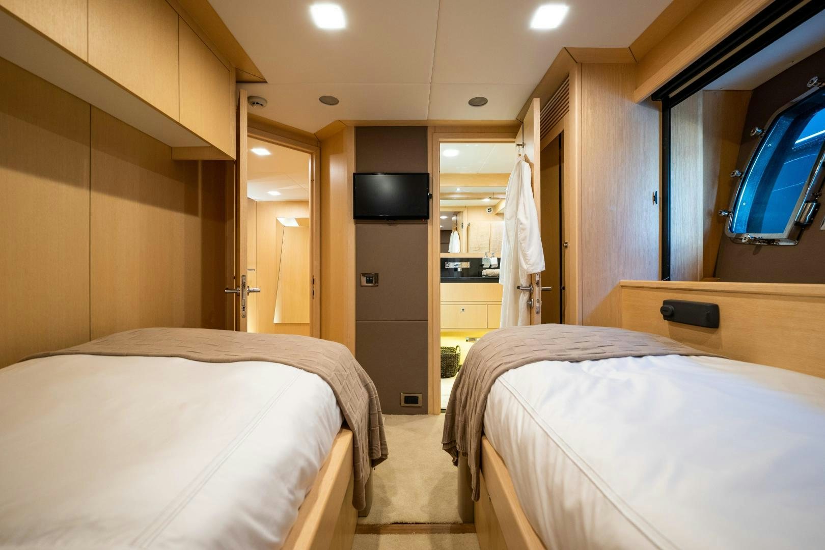 a room with two beds aboard THE KING Yacht for Sale