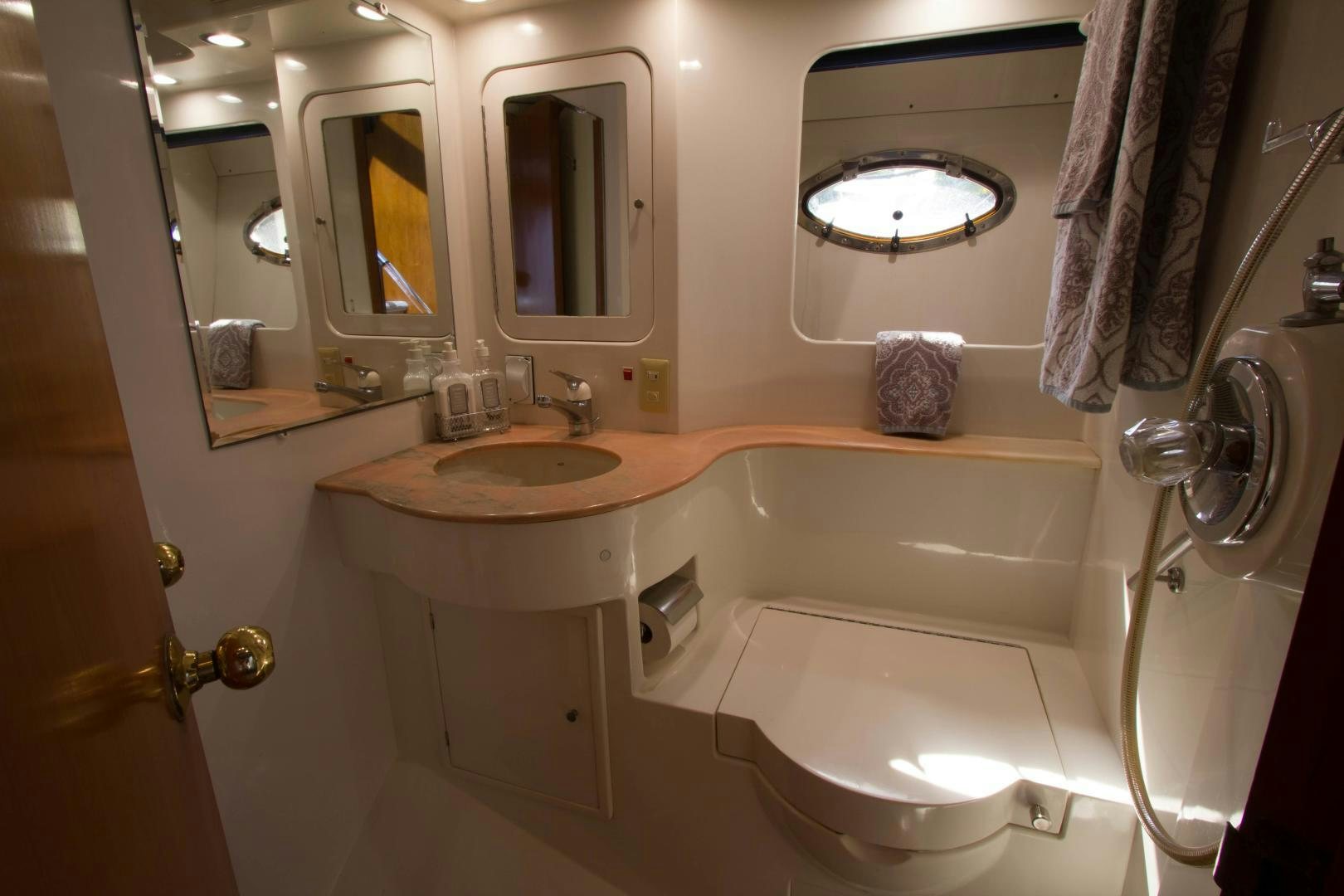 a bathroom with a sink and a bathtub aboard Seaquest Yacht for Sale