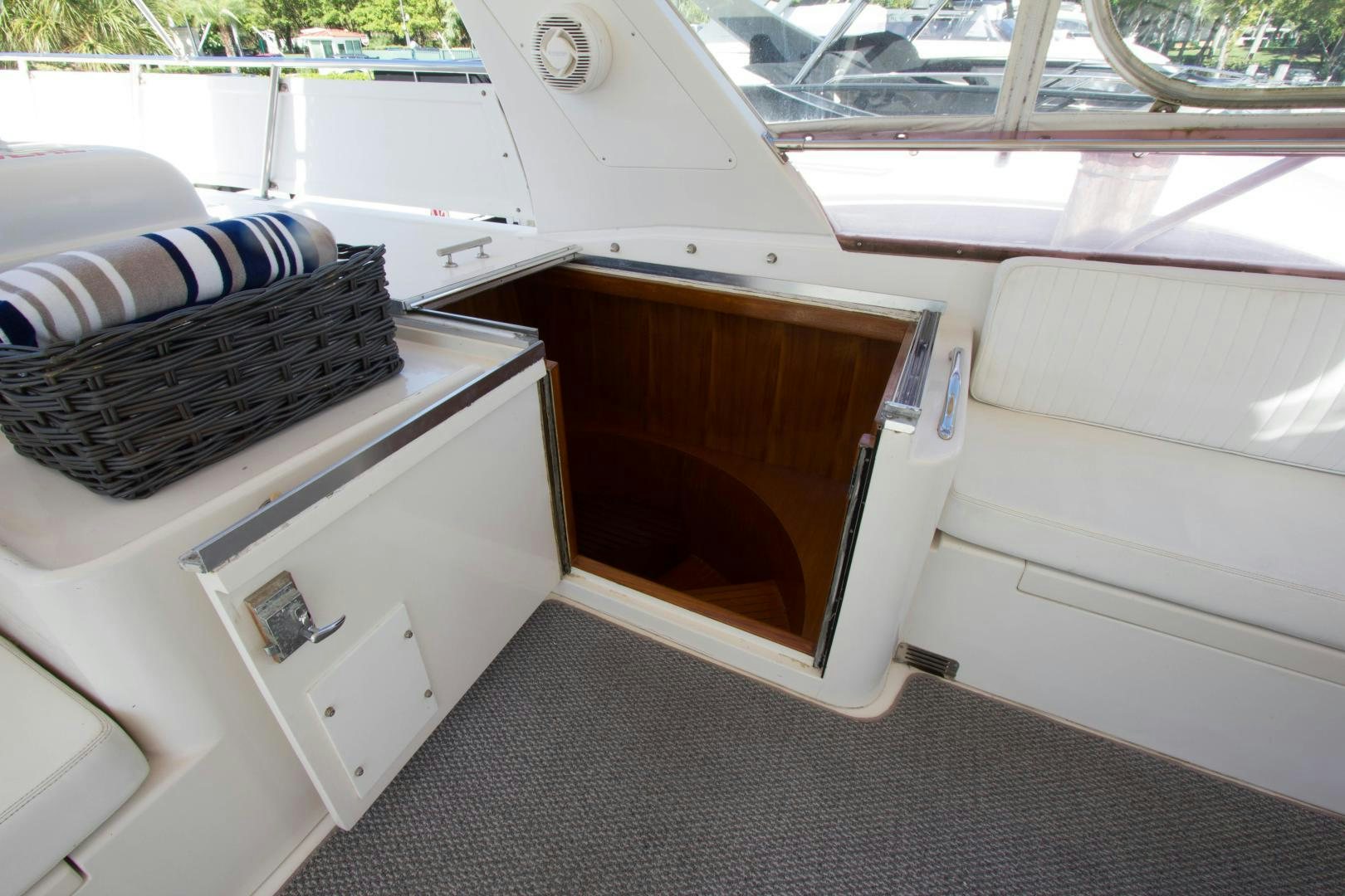 a white car with a black basket aboard Seaquest Yacht for Sale