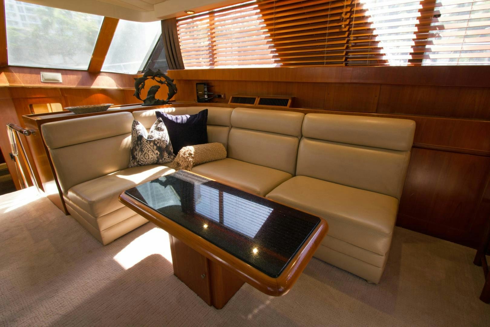 a couch with a coffee table aboard Seaquest Yacht for Sale