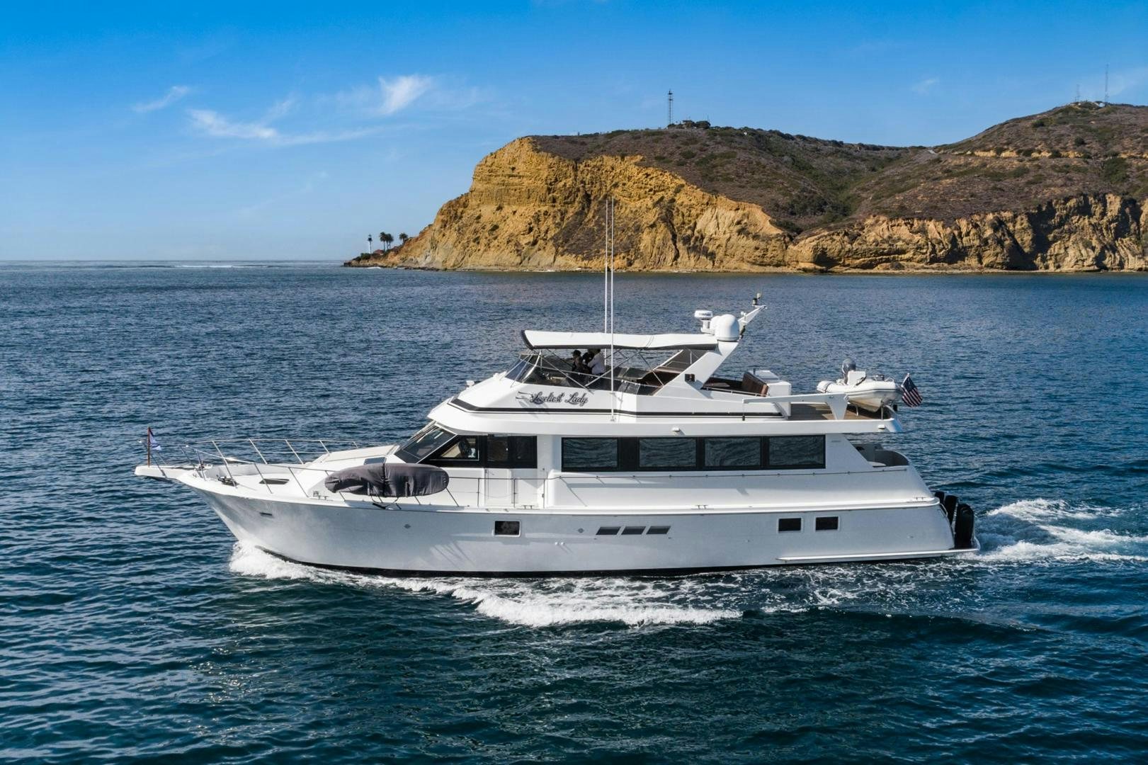 a boat on the water aboard LOVELIEST LADY Yacht for Sale