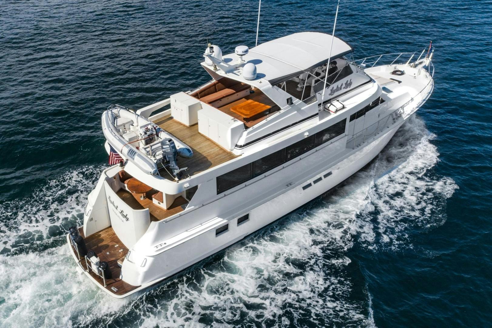 a boat on the water aboard LOVELIEST LADY Yacht for Sale