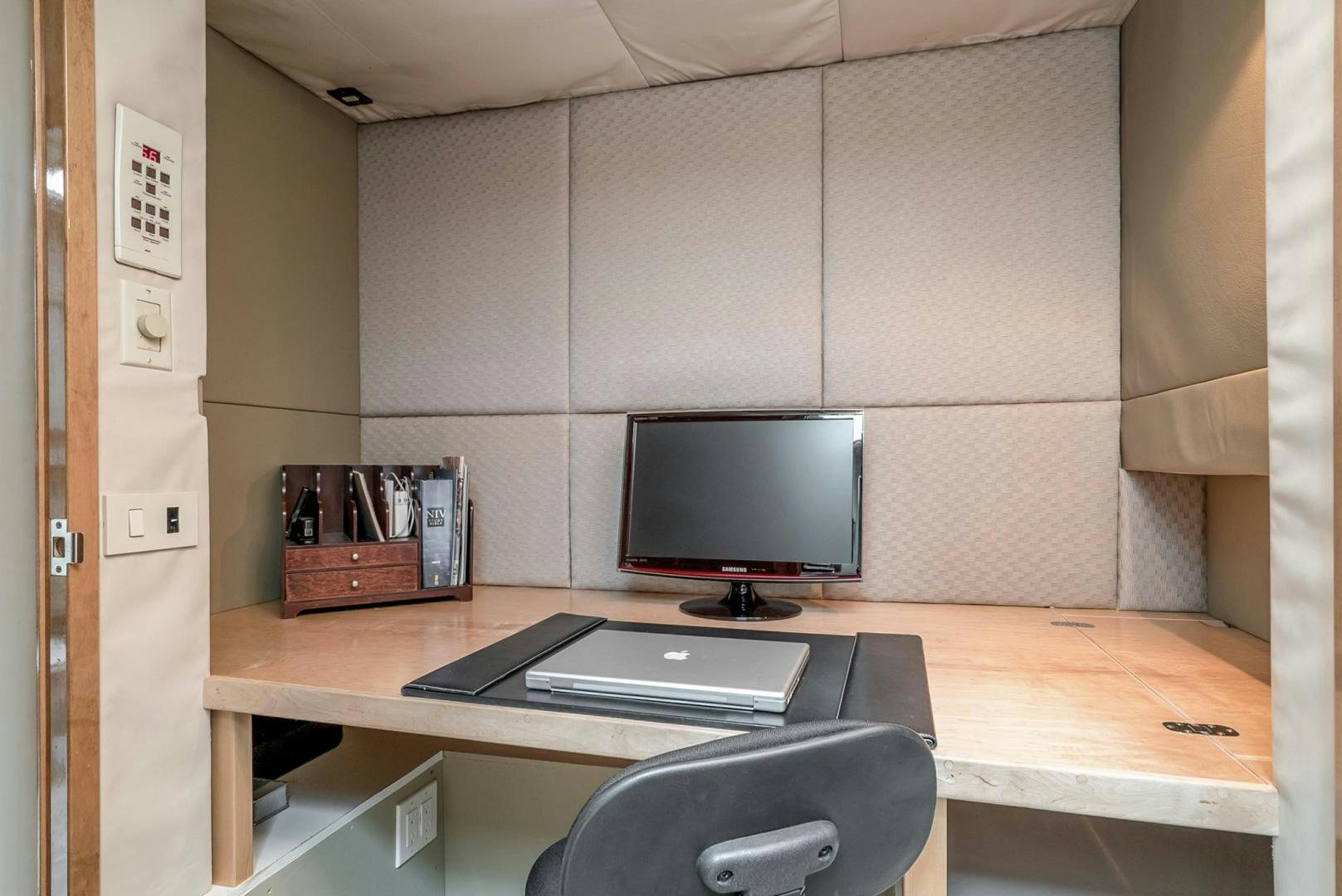 a desk with a computer and a chair aboard LOVELIEST LADY Yacht for Sale