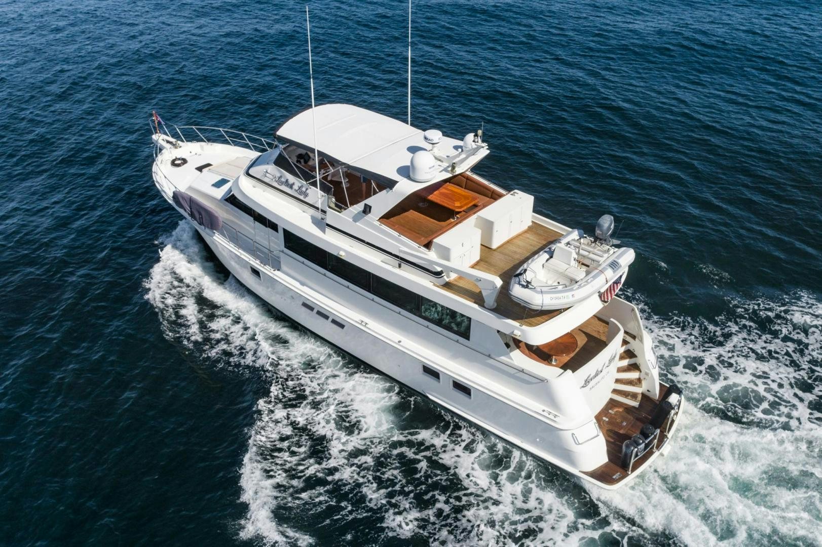a boat on the water aboard LOVELIEST LADY Yacht for Sale