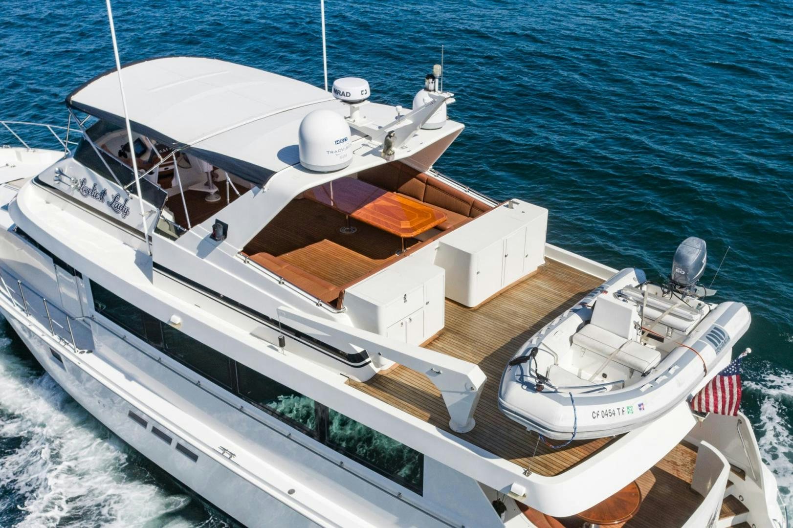 a boat on the water aboard LOVELIEST LADY Yacht for Sale