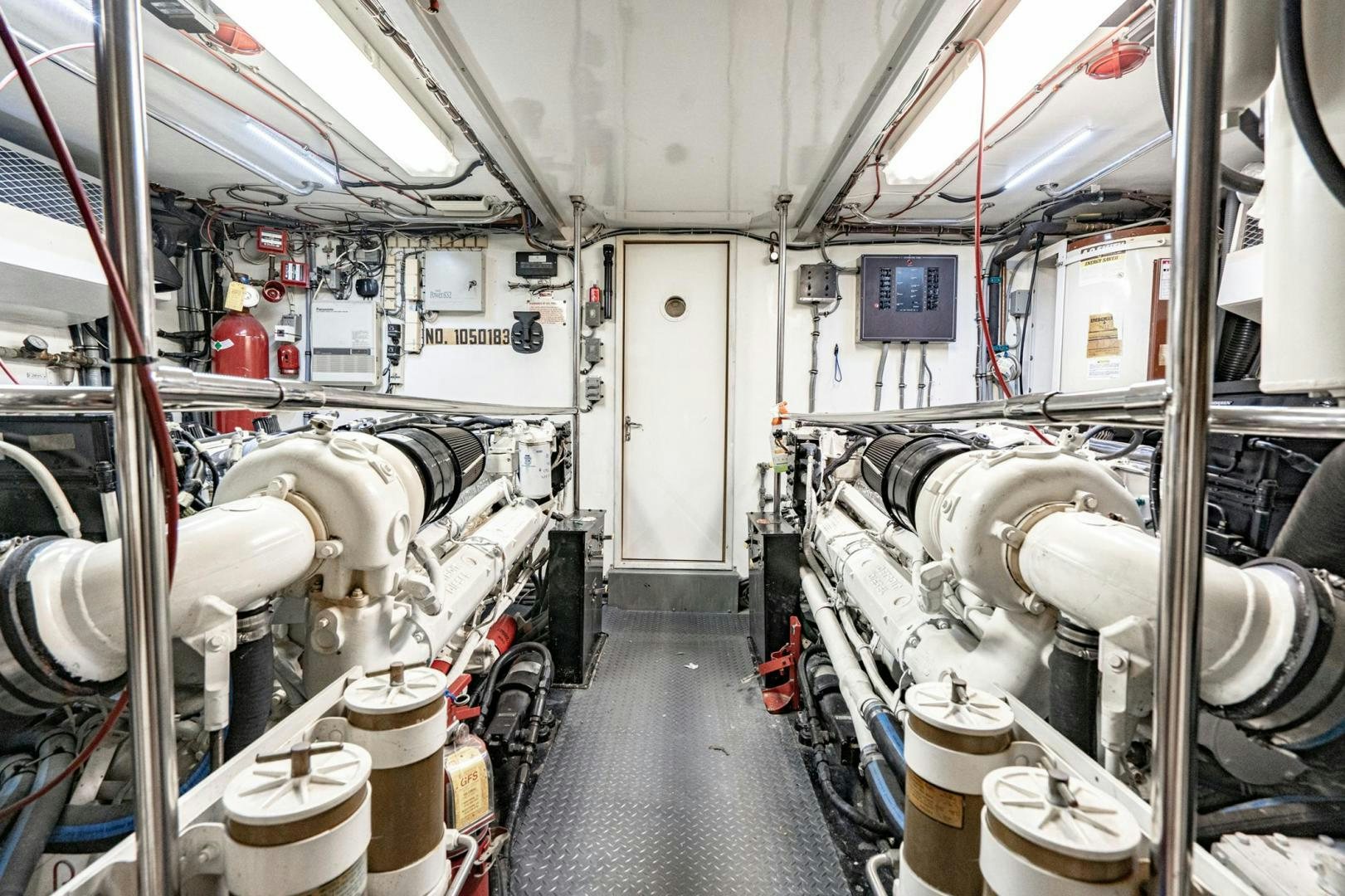 a room with pipes and equipment aboard LOVELIEST LADY Yacht for Sale