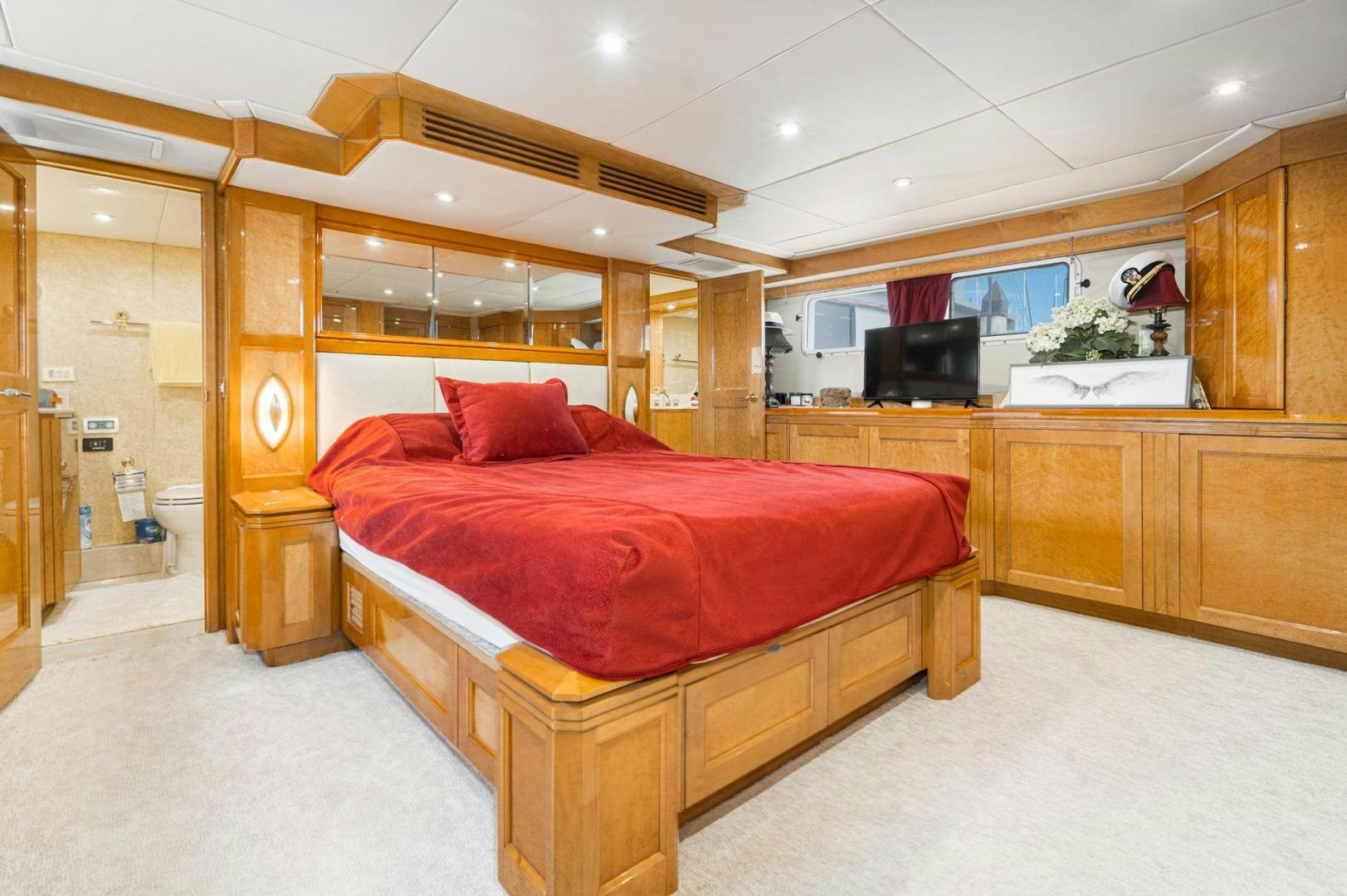 a bed in a room aboard LOVELIEST LADY Yacht for Sale