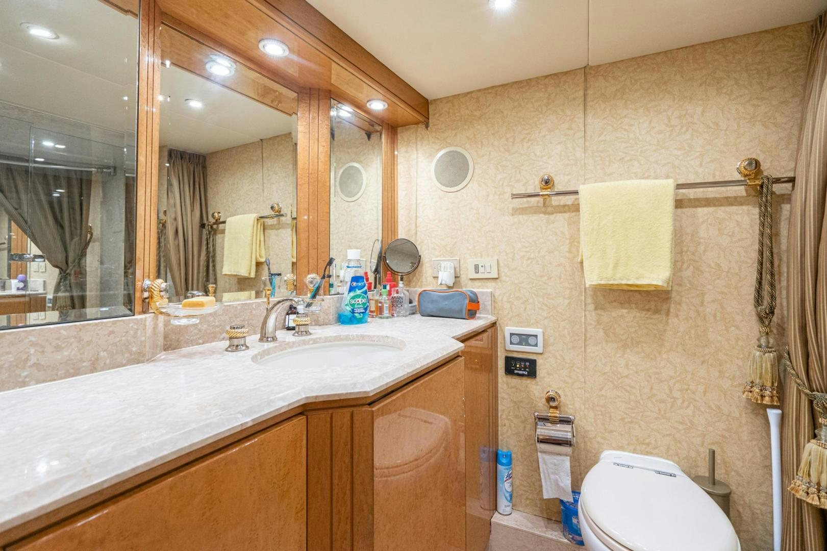 a bathroom with a large mirror aboard LOVELIEST LADY Yacht for Sale