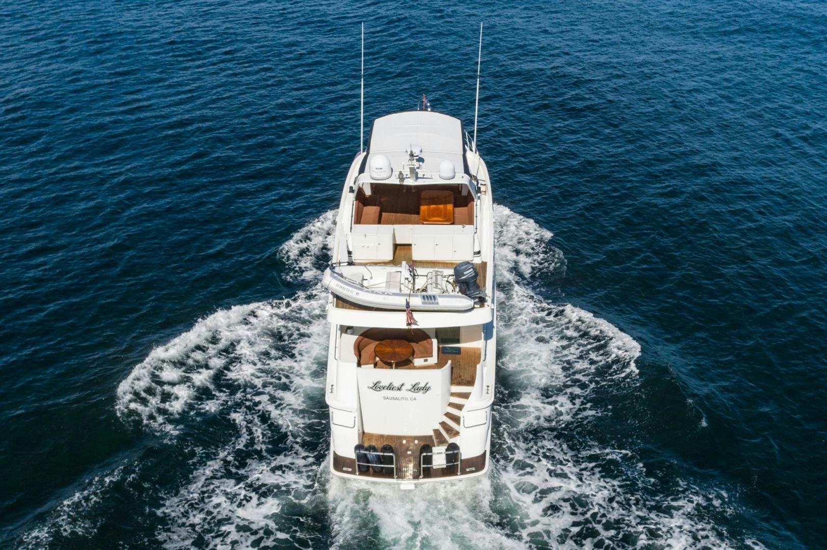 a boat on the water aboard LOVELIEST LADY Yacht for Sale