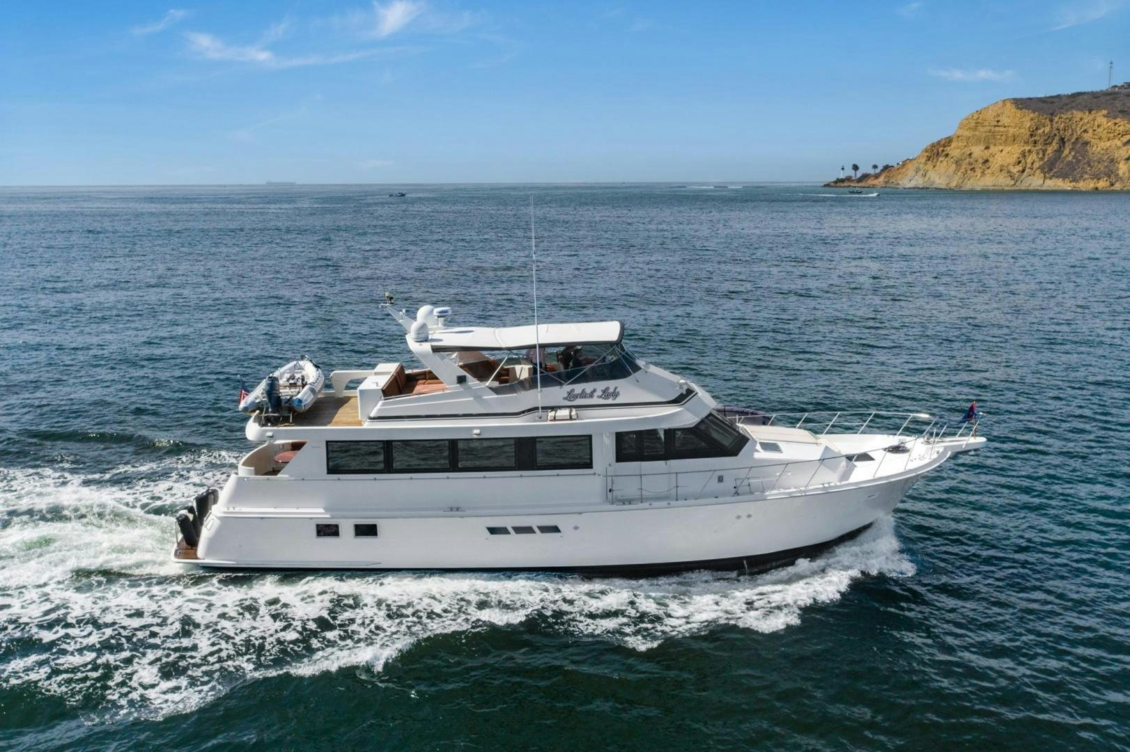 a boat on the water aboard LOVELIEST LADY Yacht for Sale