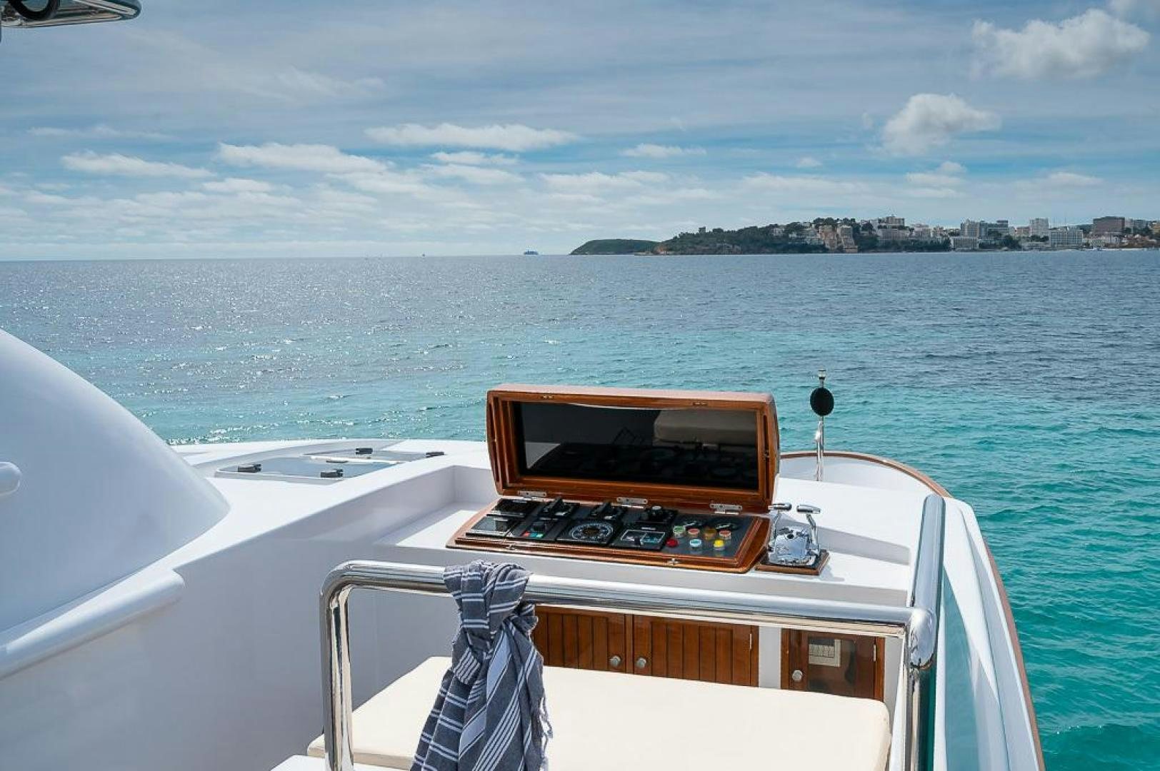 a laptop on a boat aboard CAPELLA Yacht for Sale
