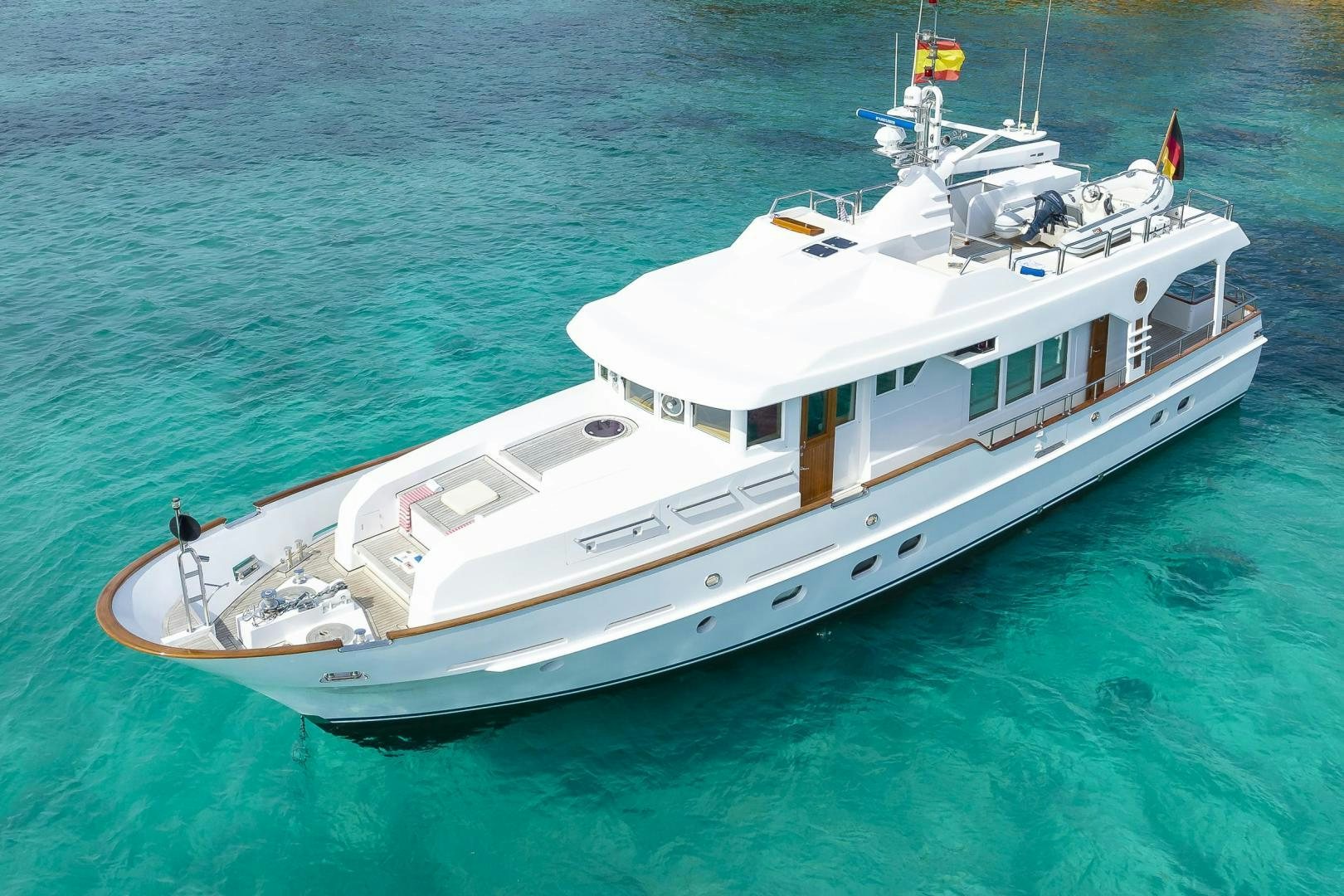 a white boat in the water aboard CAPELLA Yacht for Sale
