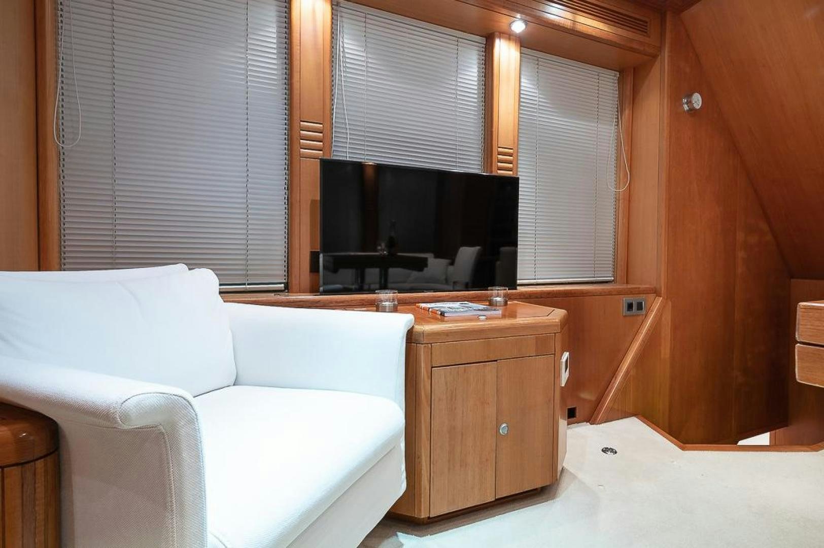 a room with a couch and a table aboard CAPELLA Yacht for Sale