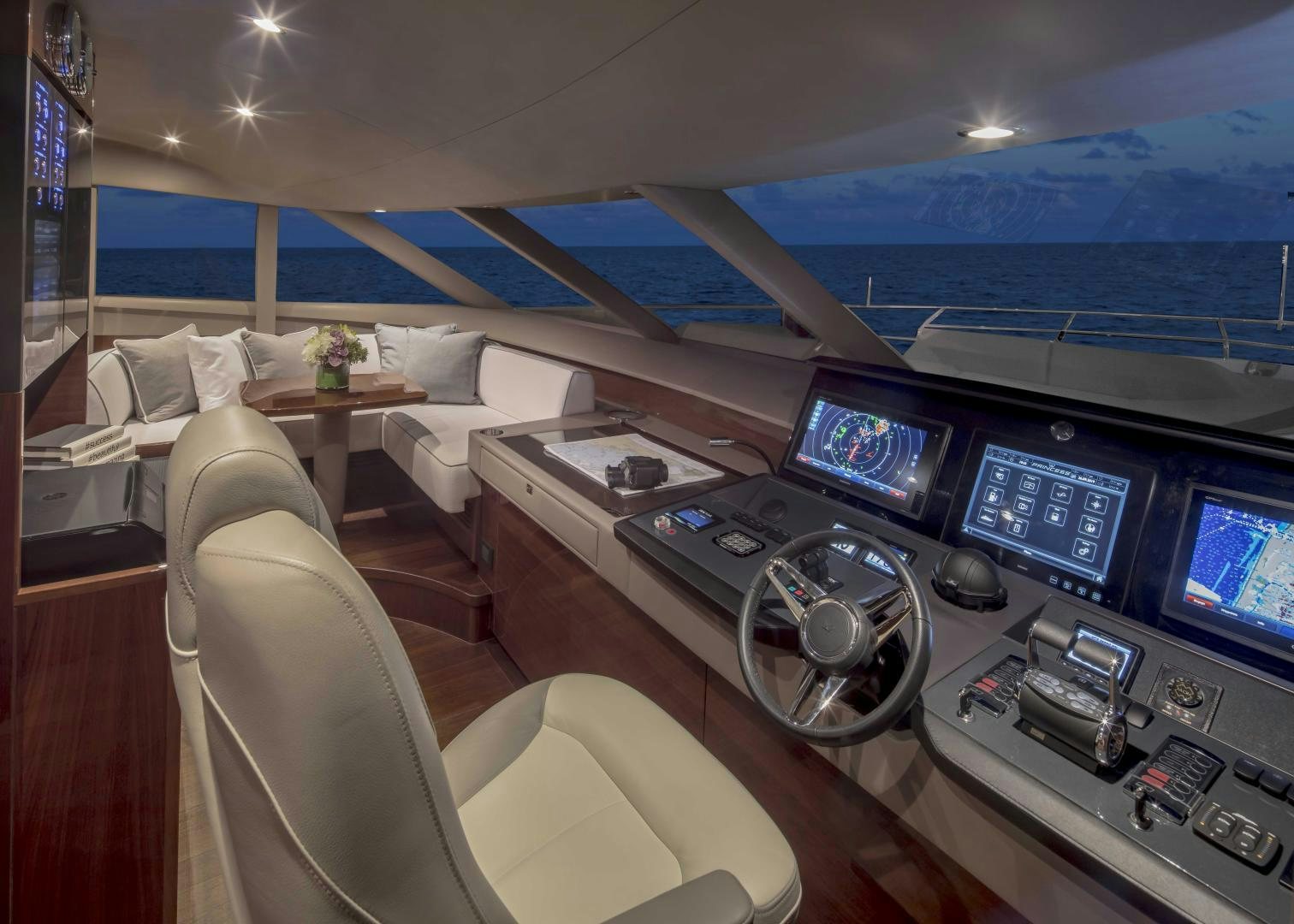 a room with a desk and several computers aboard HOT PURSUIT Yacht for Sale