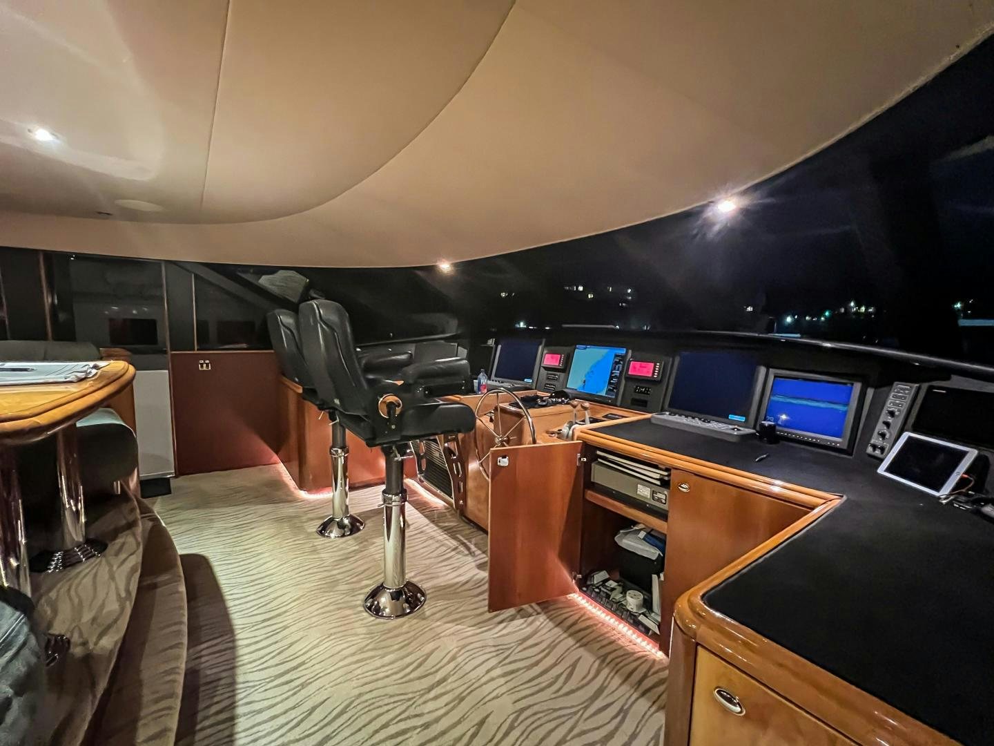 a room with a desk and computer aboard SERENGETI Yacht for Sale