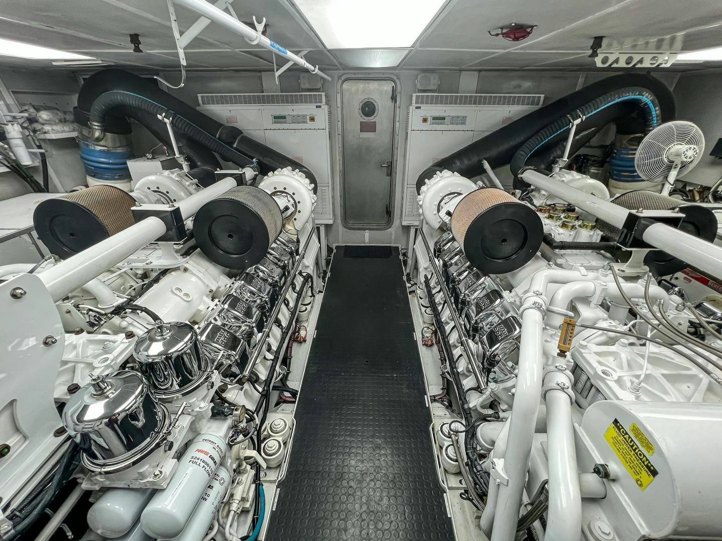 a row of white pipes aboard SERENGETI Yacht for Sale