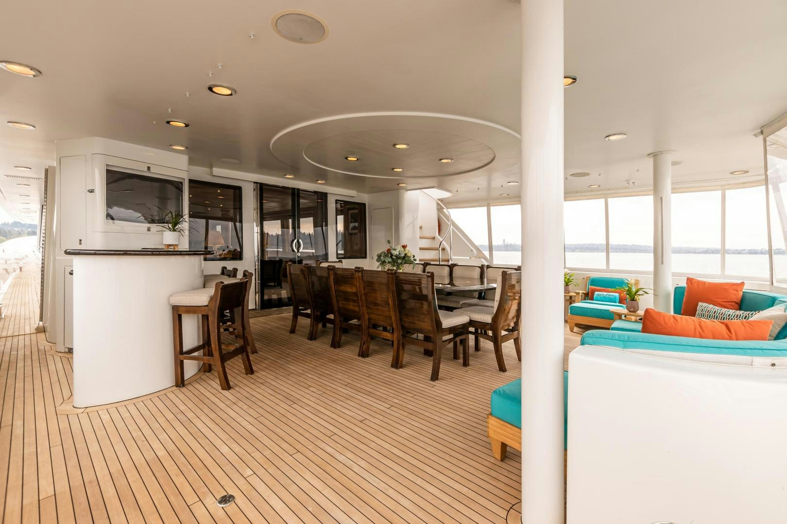 a large open kitchen and dining area aboard SERENGETI Yacht for Sale