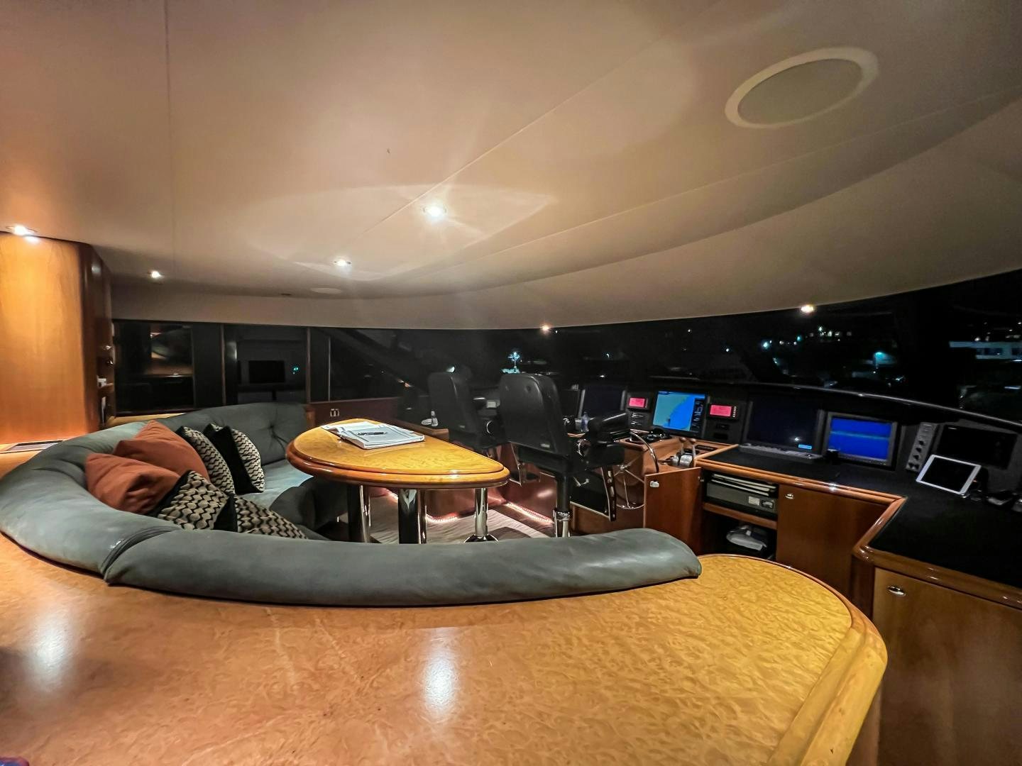 a person sleeping on a couch aboard SERENGETI Yacht for Sale