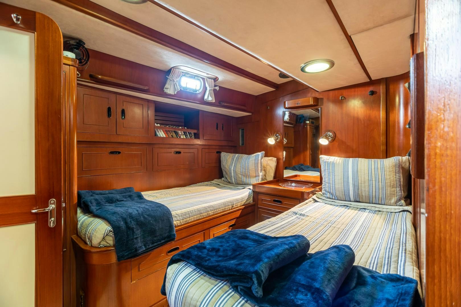 a room with bunk beds aboard MUSTANG Yacht for Sale