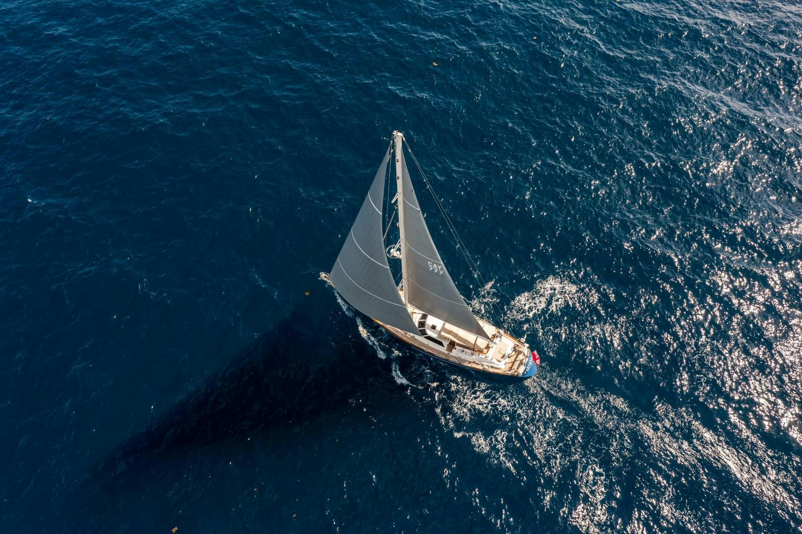 a sailboat in the ocean aboard MUSTANG Yacht for Sale