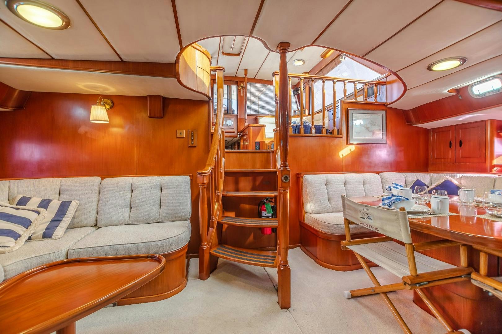 a living room with a bunk bed aboard MUSTANG Yacht for Sale