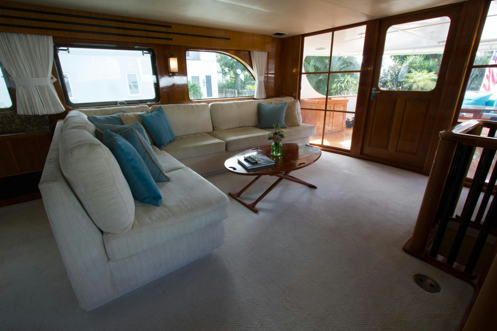 a living room with a couch and a coffee table aboard SEA CZAR Yacht for Sale
