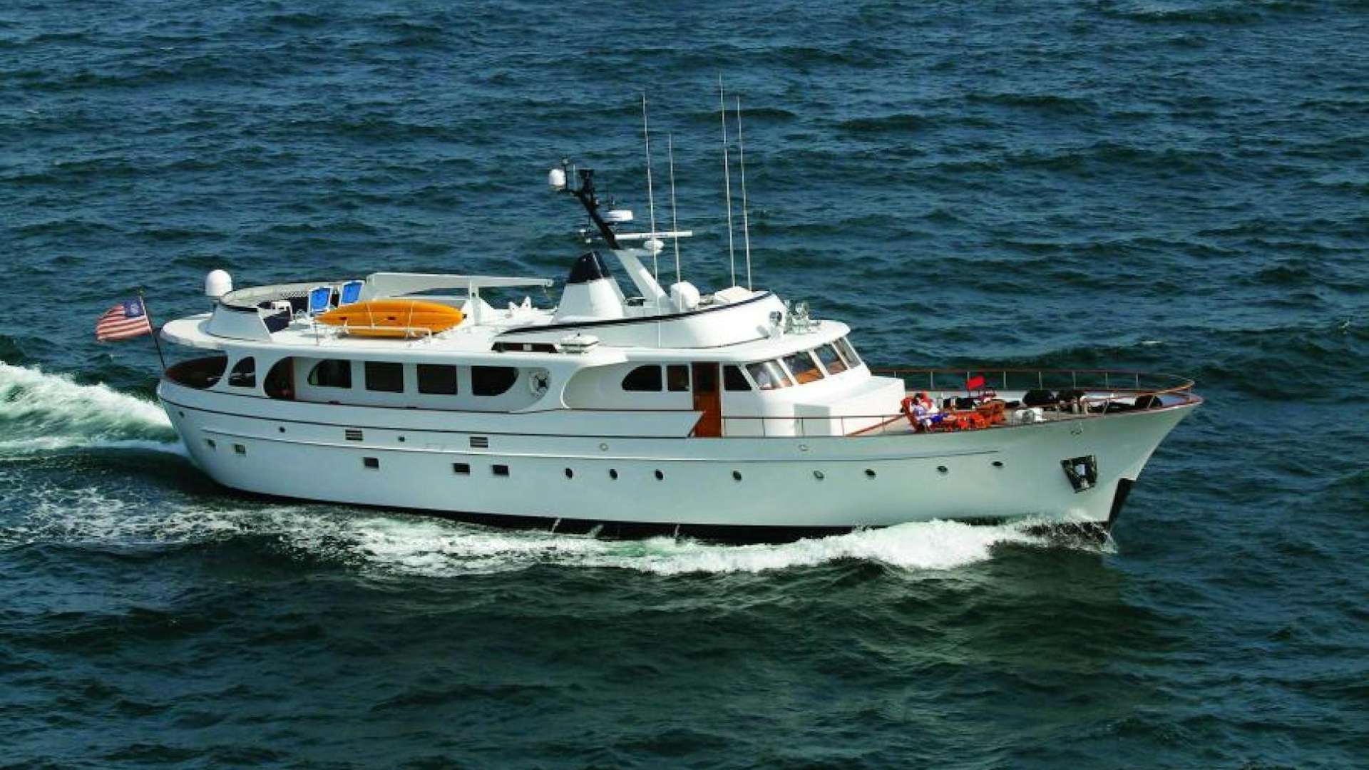 a white boat on the water aboard SEA CZAR Yacht for Sale