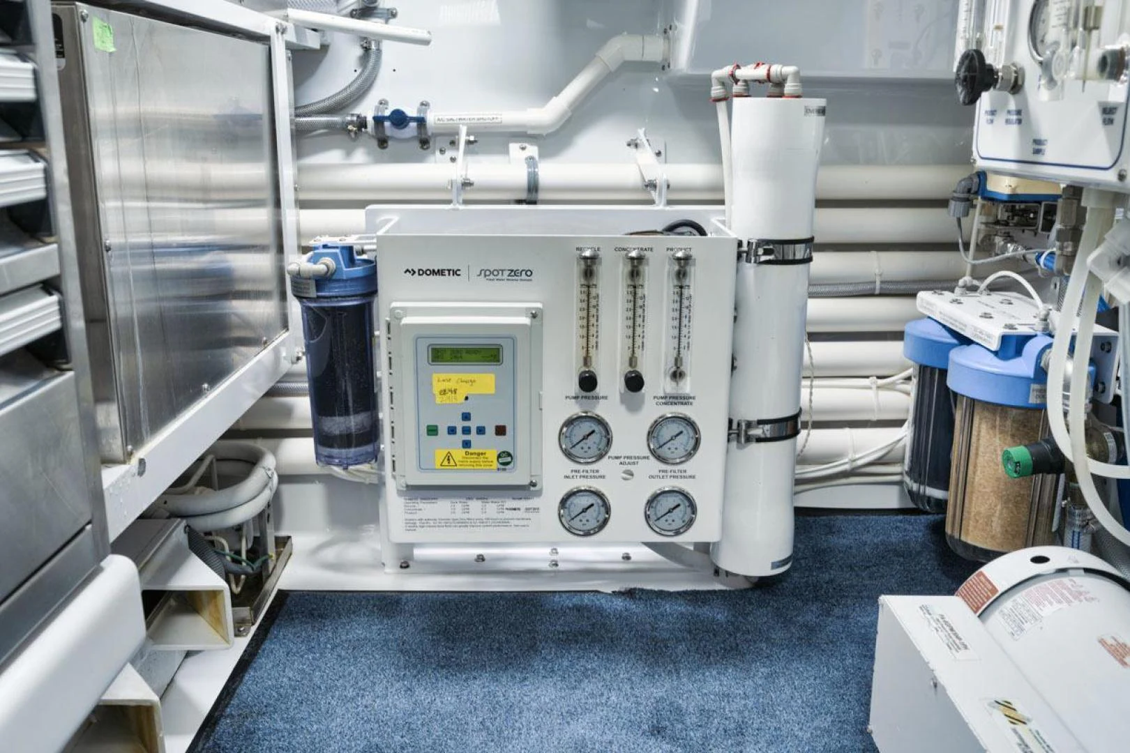 a machine in a room aboard OWL'S NEST Yacht for Sale