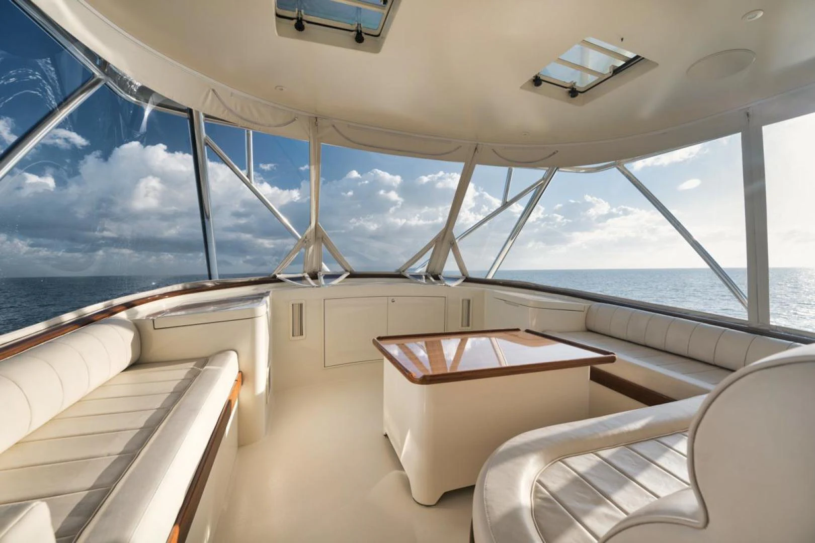 a room with a view of the ocean and the ocean aboard OWL'S NEST Yacht for Sale