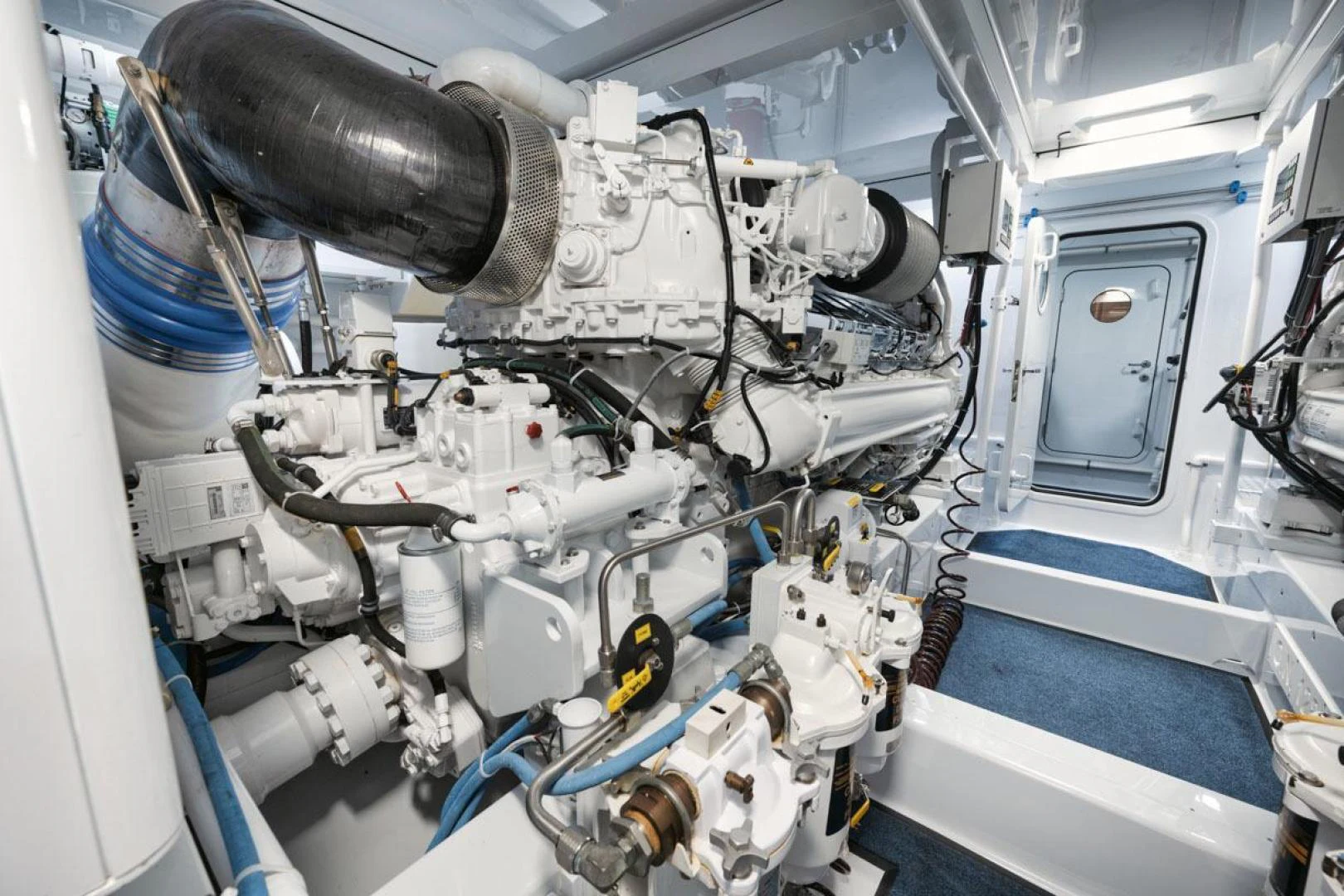 a close-up of a car engine aboard OWL'S NEST Yacht for Sale